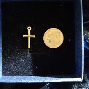 Very cute Silvertone Cross Charm